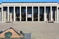 The symbol of zero kilometer monument and Palace of the Republic on October Square in Minsk, Belarus