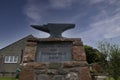 A symbolic anvil on display in the village of Gretna Green in Scotland