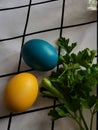Yellow and blue Easter egg on the table Royalty Free Stock Photo