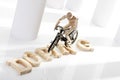 Symbolic for doping: Wooden figurine on racing cycle Royalty Free Stock Photo