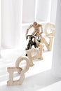 Symbolic for doping: Wooden figurine on racing cycle Royalty Free Stock Photo