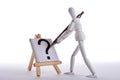 White figure paints a question mark Royalty Free Stock Photo