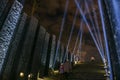 Symbolic light rays and candles near the Memorial to Holodomor victims during a commemoration ceremony in Kyiv, Ukraine