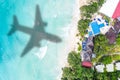 Symbolic picture vacation travel traveling luxury villa sea airplane flying Seychelles aerial photo beach Royalty Free Stock Photo