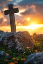 Symbolic representation of resurrection empty tomb stone with cross on sunrise meadow field