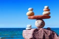 Concept of harmony and balance. Balance stones against the sea. Royalty Free Stock Photo