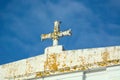 Symbolic White Cross on roof
