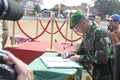 Symbolization Cooperation Between Local Officials and Army