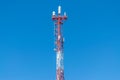 symbolizing the modern way of messaging and communication. the receiving antenna of the TV signal. blue sky background. steel Royalty Free Stock Photo