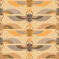 Symbols of ancient Egypt in the form of a nonsense pattern with an illustration of a scarab beetle with a sun symbol in