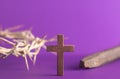Symbols of the Crucifixion on a Purple Background Royalty Free Stock Photo