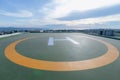 Symbols for helicopter parking on the roof of an office building. Royalty Free Stock Photo