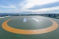 Symbols for helicopter parking on the roof of an office building. Royalty Free Stock Photo