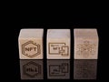 Symbols NFT on wood cubes as concept of using non-fungible tokens
