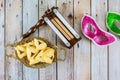 Symbols of Purim, the Jewish holiday celebrating the including cookies, shofar tallit, carnival masks, and hamantaschen.