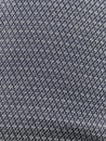 Symetrical cloth pattern with grey and white colored thread