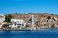 SYMI, Greece - JUN 03, 2021. The harbour of Symi town with the districts of Chorio and Gialos is one of the most beautiful and