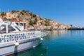 Cruise boat in port of Gialos, Symi island, Greece