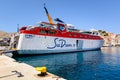 Sea Dreams ferry at the port of Gialos during the summer season. Symi island, Greece