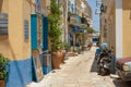 Symi Island, Greece - June 27, 2019: View of bright blue and yellow streets of Symi Island, Greece