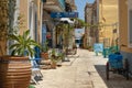 Symi Island, Greece - June 27, 2019: View of bright blue and yellow streets of Symi Island, Greece
