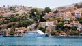 Symi town, Symi island, pictorial view of colorful houses and the harbour