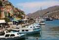 Symi town, Symi island, pictorial view of colorful houses and Yialos harbour