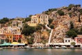 Symi town, Symi island, pictorial view of colorful houses and Yialos harbour