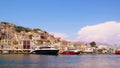 Symi town, Symi island, pictorial view of colorful houses and Yialos harbour