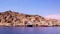 Symi town, Symi island, pictorial view of colorful houses and Yialos harbour