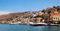 Symi town, Symi island, pictorial view of colorful houses and Yialos harbour