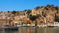 Symi town, Symi island, pictorial view of colorful houses and Yialos harbour