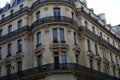 Symmetric architecture and tiny long balconies in Paris Royalty Free Stock Photo