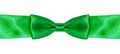 Symmetric bow knot on green satin ribbon close up