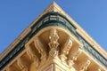 Symmetric central corner view of facade wity big traditional balcony of Grandmaster Palace in Valletta