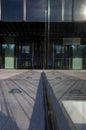 symmetric glass light reflection in office entrance