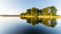 Symmetric reflections on calm lake Royalty Free Stock Photo