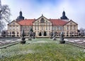 Symmetric view of winterly Hundisburg Castle with palace grounds in Germany