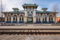 symmetrical front view of greek revival train station