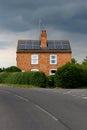 Symmetrical House Solar Panels Rain Cloud Royalty Free Stock Photo