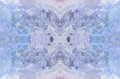 Symmetrical kaleidoscopic blue and mauve pattern