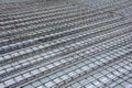 Symmetrical pattern of iron bars in construction site Royalty Free Stock Photo