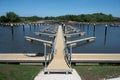 Symmetrical pattern of pontoons and piles in an empty boat marina