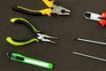 Symmetrical pattern series green nippers clerical knife screwdriver background construction network power supply repair