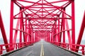 Symmetrical red steel structure construction of bridge and road in, Taiwan Royalty Free Stock Photo