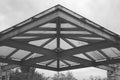 Symmetrical roof structure in black and white.