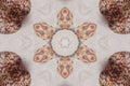Symmetrical Seashell Kaleidoscope Ornament Pattern in Beige Sand Background Image Royalty Free Stock Photo