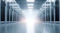 Symmetrical server room corridor with glowing light at the end. Ideal for illustrating concepts of data, technology, Royalty Free Stock Photo