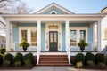 symmetrical shot of a colonial house with a central front door