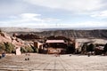 Symmetrical shot of RedRocks Amphitheater on a Beautiful Sunny Skies Day with Surrounding Mountain Landscape Background